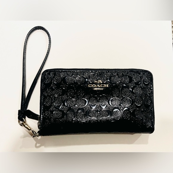Coach Handbags - Coach Embossed C Wristlet